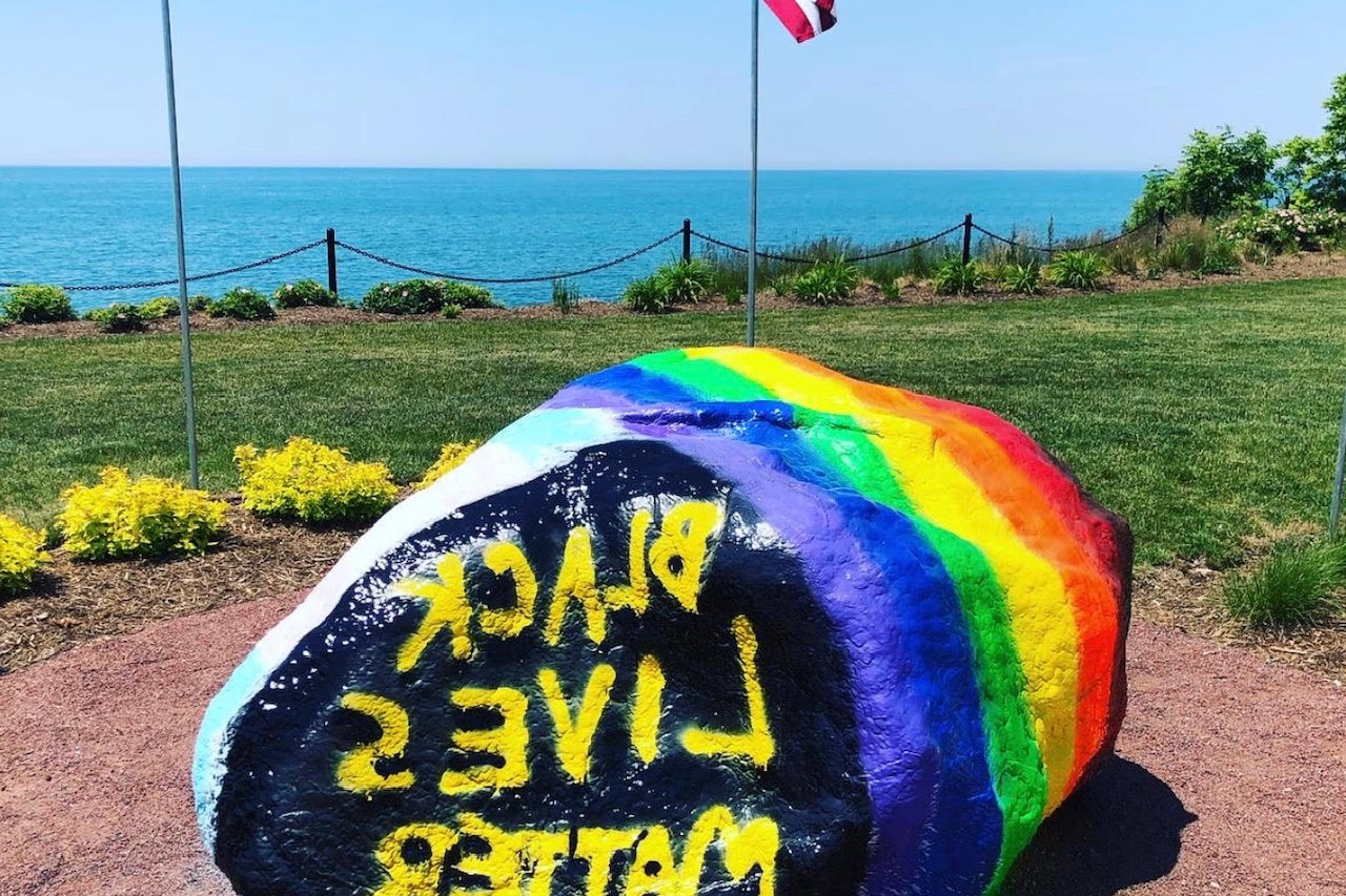 靠谱的网络彩票平台?s Kissing Rock is painted to mark Pride Month and the Black Lives Matter movement in Jun...